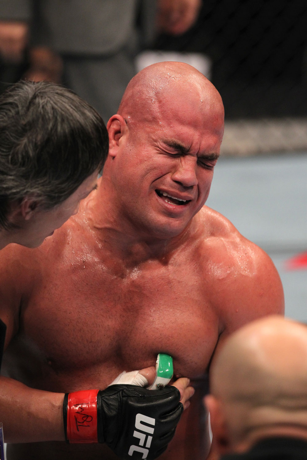 TORONTO, ON - DECEMBER 10:  Tito Ortiz exhibits the pain of a blow to the ribs after his TKO loss to Antonio Rogerio Nogueira during the UFC 140 event at Air Canada Centre on December 10, 2011 in Toronto, Ontario, Canada.  (Photo by Nick Laham/Zuffa LLC/Zuffa LLC via Getty Images)