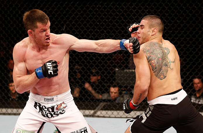 SAO PAULO, BRAZIL - JANUARY 19: (L-R) C.B. Dolloway punches Daniel Sarafian in their middleweight fight at the UFC on FX event on January 19, 2013 at Ibirapuera Gymnasium in Sao Paulo, Brazil. (Photo by Josh Hedges/Zuffa LLC/Zuffa LLC via Getty Images)