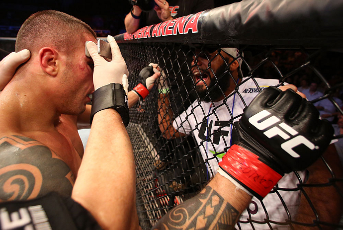 SAO PAULO, BRAZIL - JANUARY 19: Daniel Sarafian receives treatment from his cut man after his middleweight fight against C.B. Dolloway at the UFC on FX event on January 19, 2013 at Ibirapuera Gymnasium in Sao Paulo, Brazil. (Photo by Josh Hedges/Zuffa LLC/Zuffa LLC via Getty Images)