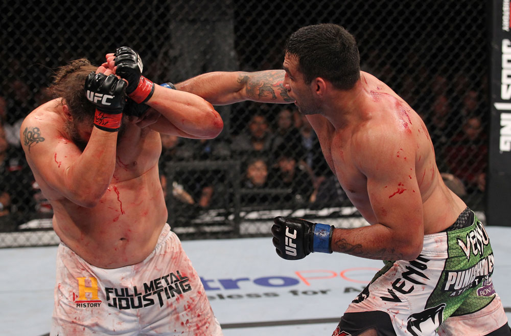 LAS VEGAS, NV - FEBRUARY 04:  (R-L) Fabricio Werdum punches Roy Nelson during the UFC 143 event at Mandalay Bay Events Center on February 4, 2012 in Las Vegas, Nevada.  (Photo by Nick Laham/Zuffa LLC/Zuffa LLC via Getty Images) *** Local Caption *** Fabricio Werdum; Roy Nelson