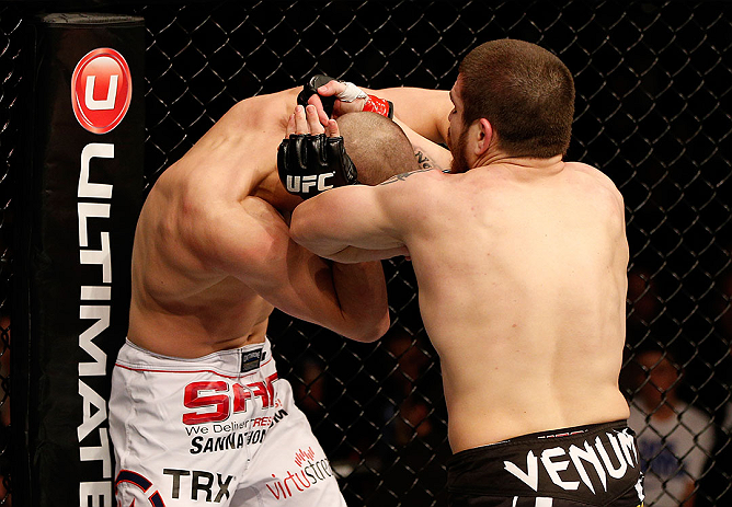 LAS VEGAS, NV - DECEMBER 29:  (R-L) Jim Miller punches Joe Lauzon during their lightweight fight at UFC 155 on December 29, 2012 at MGM Grand Garden Arena in Las Vegas, Nevada. (Photo by Josh Hedges/Zuffa LLC/Zuffa LLC via Getty Images) *** Local Caption *** Joe Lauzon; Jim Miller