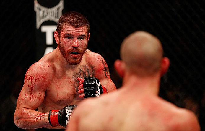 LAS VEGAS, NV - DECEMBER 29:  (L-R) Jim Miller andJoe Lauzon face off during their lightweight fight at UFC 155 on December 29, 2012 at MGM Grand Garden Arena in Las Vegas, Nevada. (Photo by Donald Miralle/Zuffa LLC/Zuffa LLC via Getty Images) *** Local Caption *** Joe Lauzon; Jim Miller