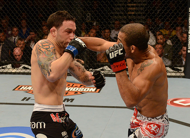 LAS VEGAS, NV - FEBRUARY 02: (R-L) Jose Aldo punches Frankie Edgar during their featherweight title fight at UFC 156 on February 2, 2013 at the Mandalay Bay Events Center in Las Vegas, Nevada. (Photo by Donald Miralle/Zuffa LLC/Zuffa LLC via Getty Images) *** Local Caption *** Jose Aldo; Frankie Edgar