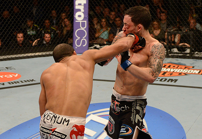 LAS VEGAS, NV - FEBRUARY 02: (L-R) Jose Aldo punches Frankie Edgar during their featherweight title fight at UFC 156 on February 2, 2013 at the Mandalay Bay Events Center in Las Vegas, Nevada. (Photo by Donald Miralle/Zuffa LLC/Zuffa LLC via Getty Images) *** Local Caption *** Jose Aldo; Frankie Edgar