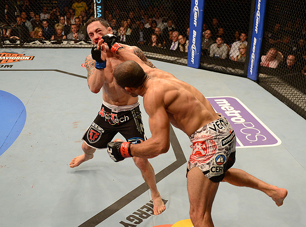 LAS VEGAS, NV - FEBRUARY 02: (R-L) Jose Aldo punches Frankie Edgar during their featherweight title fight at UFC 156 on February 2, 2013 at the Mandalay Bay Events Center in Las Vegas, Nevada. (Photo by Donald Miralle/Zuffa LLC/Zuffa LLC via Getty Images) *** Local Caption *** Jose Aldo; Frankie Edgar