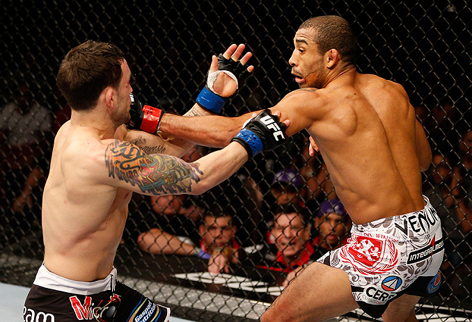 LAS VEGAS, NV - FEBRUARY 02: (R-L) Jose Aldo punches Frankie Edgar during their featherweight title fight at UFC 156 on February 2, 2013 at the Mandalay Bay Events Center in Las Vegas, Nevada. (Photo by Josh Hedges/Zuffa LLC/Zuffa LLC via Getty Images) *** Local Caption *** Jose Aldo; Frankie Edgar