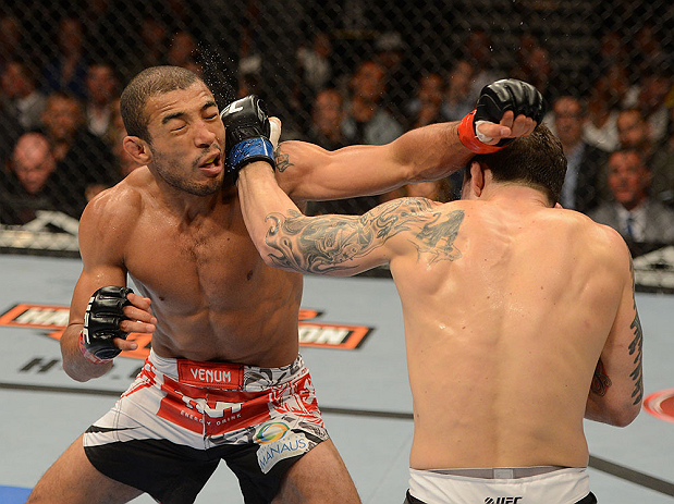LAS VEGAS, NV - FEBRUARY 02: (R-L) Frankie Edgar punches Jose Aldo during their featherweight title fight at UFC 156 on February 2, 2013 at the Mandalay Bay Events Center in Las Vegas, Nevada. (Photo by Donald Miralle/Zuffa LLC/Zuffa LLC via Getty Images) *** Local Caption *** Jose Aldo; Frankie Edgar