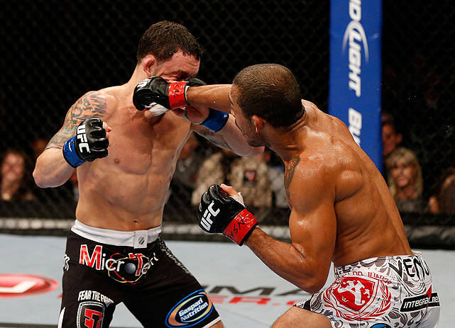 LAS VEGAS, NV - FEBRUARY 02: (R-L) Jose Aldo punches Frankie Edgar during their featherweight title fight at UFC 156 on February 2, 2013 at the Mandalay Bay Events Center in Las Vegas, Nevada. (Photo by Josh Hedges/Zuffa LLC/Zuffa LLC via Getty Images) *** Local Caption *** Jose Aldo; Frankie Edgar