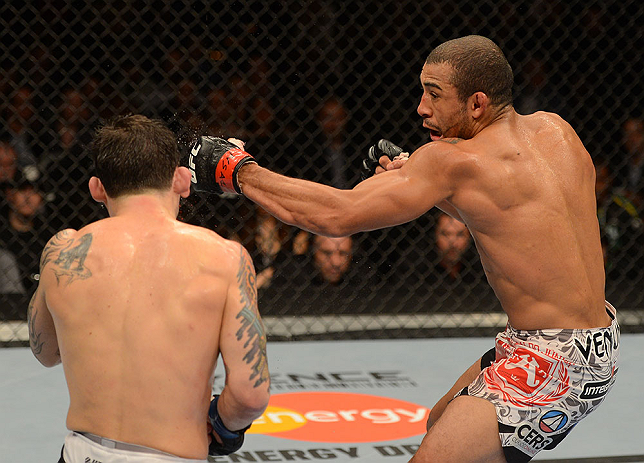LAS VEGAS, NV - FEBRUARY 02: (R-L) Jose Aldo punches Frankie Edgar during their featherweight title fight at UFC 156 on February 2, 2013 at the Mandalay Bay Events Center in Las Vegas, Nevada. (Photo by Donald Miralle/Zuffa LLC/Zuffa LLC via Getty Images) *** Local Caption *** Jose Aldo; Frankie Edgar