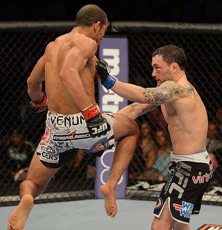 LAS VEGAS, NV - FEBRUARY 02: Jose Aldo (left) knees Frankie Edgar during their featherweight title fight at UFC 156 on February 2, 2013 at the Mandalay Bay Events Center in Las Vegas, Nevada. (Photo by Donald Miralle/Zuffa LLC/Zuffa LLC via Getty Images) *** Local Caption *** Jose Aldo; Frankie Edgar