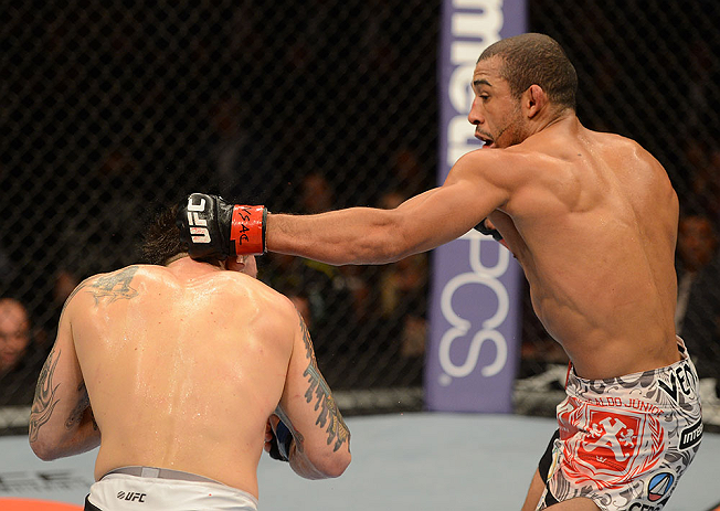 LAS VEGAS, NV - FEBRUARY 02: (R-L) Jose Aldo punches Frankie Edgar during their featherweight title fight at UFC 156 on February 2, 2013 at the Mandalay Bay Events Center in Las Vegas, Nevada. (Photo by Donald Miralle/Zuffa LLC/Zuffa LLC via Getty Images) *** Local Caption *** Jose Aldo; Frankie Edgar