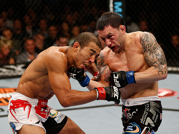 LAS VEGAS, NV - FEBRUARY 02:  (R-L) Frankie Edgar punches Jose Aldo during their featherweight title fight at UFC 156 on February 2, 2013 at the Mandalay Bay Events Center in Las Vegas, Nevada.  (Photo by Josh Hedges/Zuffa LLC/Zuffa LLC via Getty Images) *** Local Caption *** Jose Aldo; Frankie Edgar