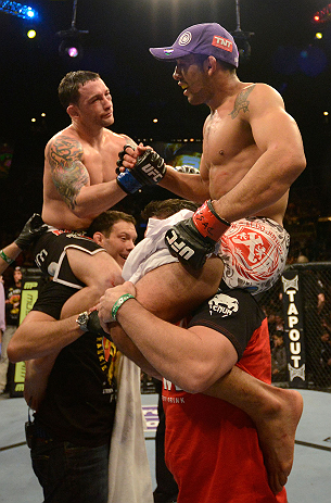 LAS VEGAS, NV - FEBRUARY 02: Frankie Edgar (upper left) and Jose Aldo (upper right) congratulate eachother after their featherweight title fight at UFC 156 on February 2, 2013 at the Mandalay Bay Events Center in Las Vegas, Nevada. (Photo by Donald Miralle/Zuffa LLC/Zuffa LLC via Getty Images) *** Local Caption *** Jose Aldo; Frankie Edgar