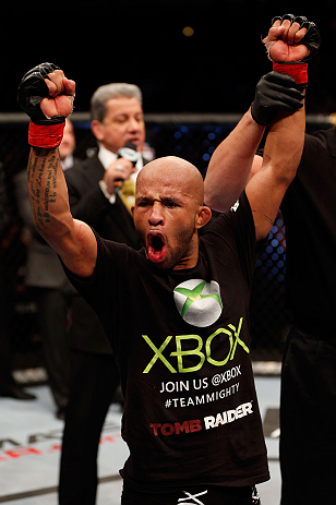 CHICAGO, IL - JANUARY 26:  Demetrious Johnson celebrates defeating John Dodson during thier Flyweight Championship Bout part of UFC on FOX at United Center on January 26, 2013 in Chicago, Illinois.  (Photo by Josh Hedges/Zuffa LLC/Zuffa LLC Via Getty Images)