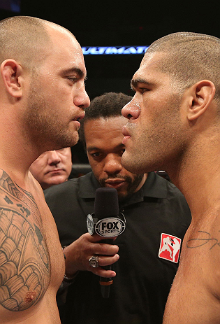 MINNEAPOLIS, MN - OCTOBER 05: Travis Browne (L) and Antonio Silva (R) receive final instructions from referee Herb Dean before their fight at the UFC on FX on October 5, 2012 in Minneapolis, Minnesota. (Photo by Josh Hedges/Zuffa LLC/Zuffa LLC via Getty Images)