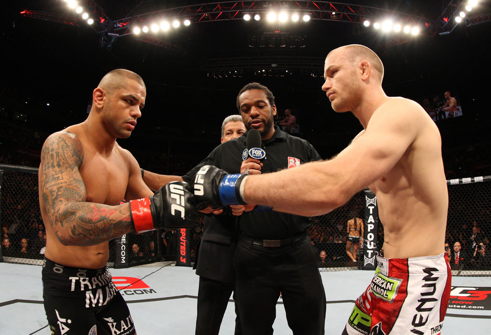 SYDNEY, AUSTRALIA - MARCH 03: (L-R) Welterweight opponents Thiago Alves and Martin Kampmann receive final instructions from referee Herb Dean before their main event bout during the UFC on FX event at Allphones Arena on March 3, 2012 in Sydney, Australia. (Photo by Josh Hedges/Zuffa LLC/Zuffa LLC via Getty Images) *** Local Caption *** Thiago Alves; Martin Kampmann; Herb Dean