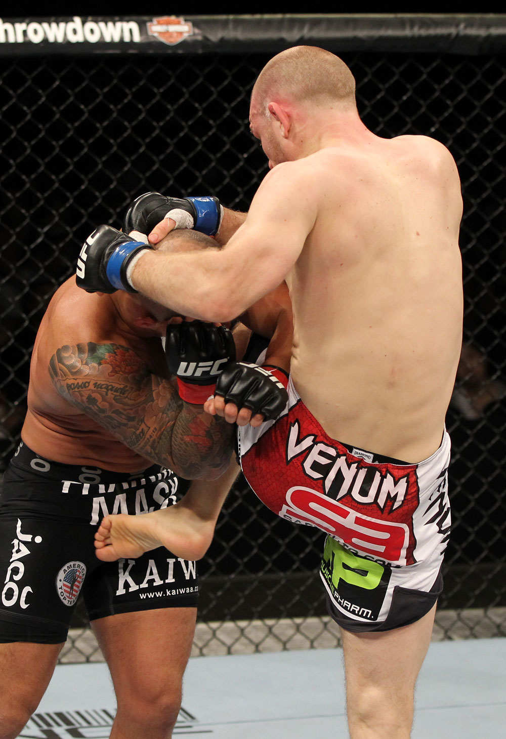 SYDNEY, AUSTRALIA - MARCH 03: (R-L) Martin Kampmann delivers a knee strike against Thiago Alves in a welterweight bout during the UFC on FX event at Allphones Arena on March 3, 2012 in Sydney, Australia. (Photo by Josh Hedges/Zuffa LLC/Zuffa LLC via Getty Images) *** Local Caption *** Thiago Alves; Martin Kampmann