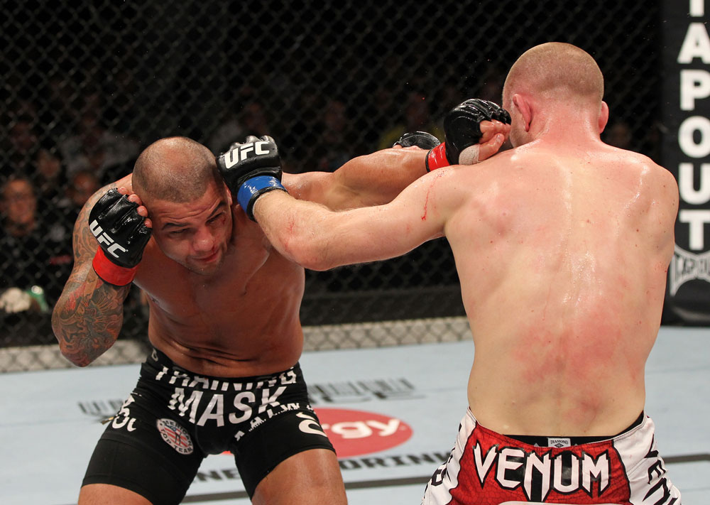 SYDNEY, AUSTRALIA - MARCH 03: (L-R) Thiago Alves and Martin Kampmann trade punches in a welterweight bout during the UFC on FX event at Allphones Arena on March 3, 2012 in Sydney, Australia. (Photo by Josh Hedges/Zuffa LLC/Zuffa LLC via Getty Images) *** Local Caption *** Thiago Alves; Martin Kampmann