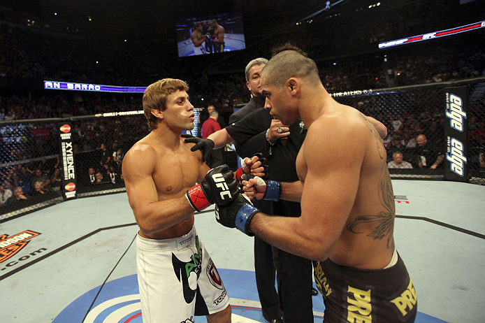 CALGARY, CANADA - JULY 21: (L-R) Urijah Faber faces off against Renan Barao during their UFC interim bantamweight championship bout at UFC 149 inside the Scotiabank Saddledome on July 21, 2012 in Calgary, Alberta, Canada.  (Photo by Nick Laham/Zuffa LLC/Zuffa LLC via Getty Images)