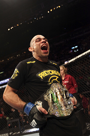 CALGARY, CANADA - JULY 21:  Renan Barao celebrates his victory over Urijah Faber during their UFC interim bantamweight championship bout at UFC 149 inside the Scotiabank Saddledome on July 21, 2012 in Calgary, Alberta, Canada.  (Photo by Nick Laham/Zuffa LLC/Zuffa LLC via Getty Images)
