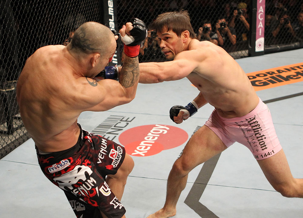 BELO HORIZONTE, BRAZIL - JUNE 23: (R-L) Rich Franklin punches Wanderlei Silva during their UFC 147 catchweight bout at Estadio Jornalista Felipe Drummond on June 23, 2012 in Belo Horizonte, Brazil. (Photo by Josh Hedges/Zuffa LLC/Zuffa LLC via Getty Images)