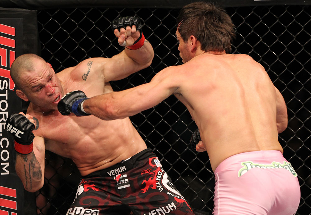 BELO HORIZONTE, BRAZIL - JUNE 23: (R-L) Rich Franklin punches Wanderlei Silva during their UFC 147 catchweight bout at Estadio Jornalista Felipe Drummond on June 23, 2012 in Belo Horizonte, Brazil. (Photo by Josh Hedges/Zuffa LLC/Zuffa LLC via Getty Images)