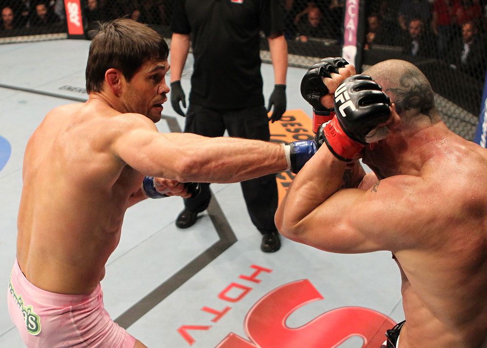 BELO HORIZONTE, BRAZIL - JUNE 23: (L-R) Rich Franklin punches Wanderlei Silva during their UFC 147 catchweight bout at Estadio Jornalista Felipe Drummond on June 23, 2012 in Belo Horizonte, Brazil. (Photo by Josh Hedges/Zuffa LLC/Zuffa LLC via Getty Images)