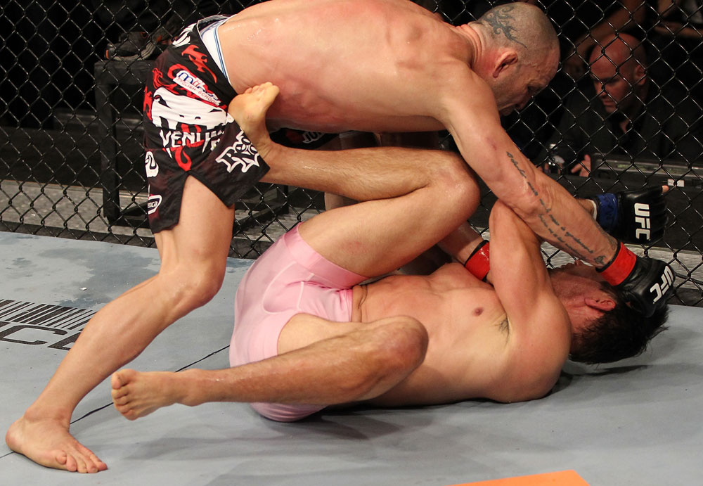 BELO HORIZONTE, BRAZIL - JUNE 23: (L-R) Wanderlei Silva punches Rich Franklin during their UFC 147 catchweight bout at Estadio Jornalista Felipe Drummond on June 23, 2012 in Belo Horizonte, Brazil. (Photo by Josh Hedges/Zuffa LLC/Zuffa LLC via Getty Images)