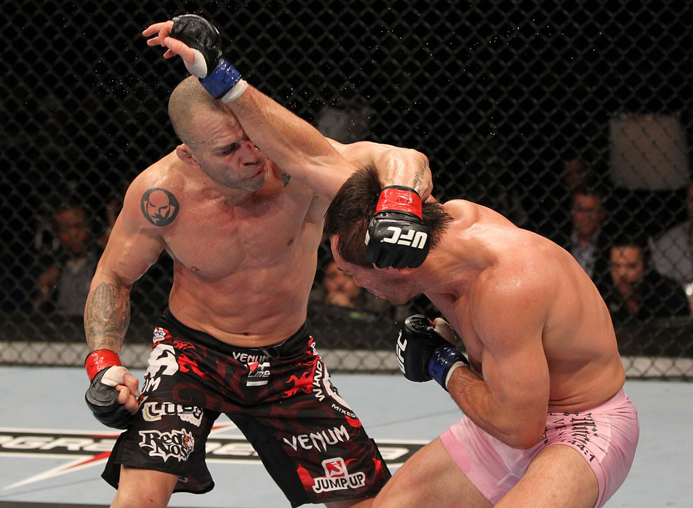 BELO HORIZONTE, BRAZIL - JUNE 23: (L-R) Wanderlei Silva punches Rich Franklin during their UFC 147 catchweight bout at Estadio Jornalista Felipe Drummond on June 23, 2012 in Belo Horizonte, Brazil. (Photo by Josh Hedges/Zuffa LLC/Zuffa LLC via Getty Images)