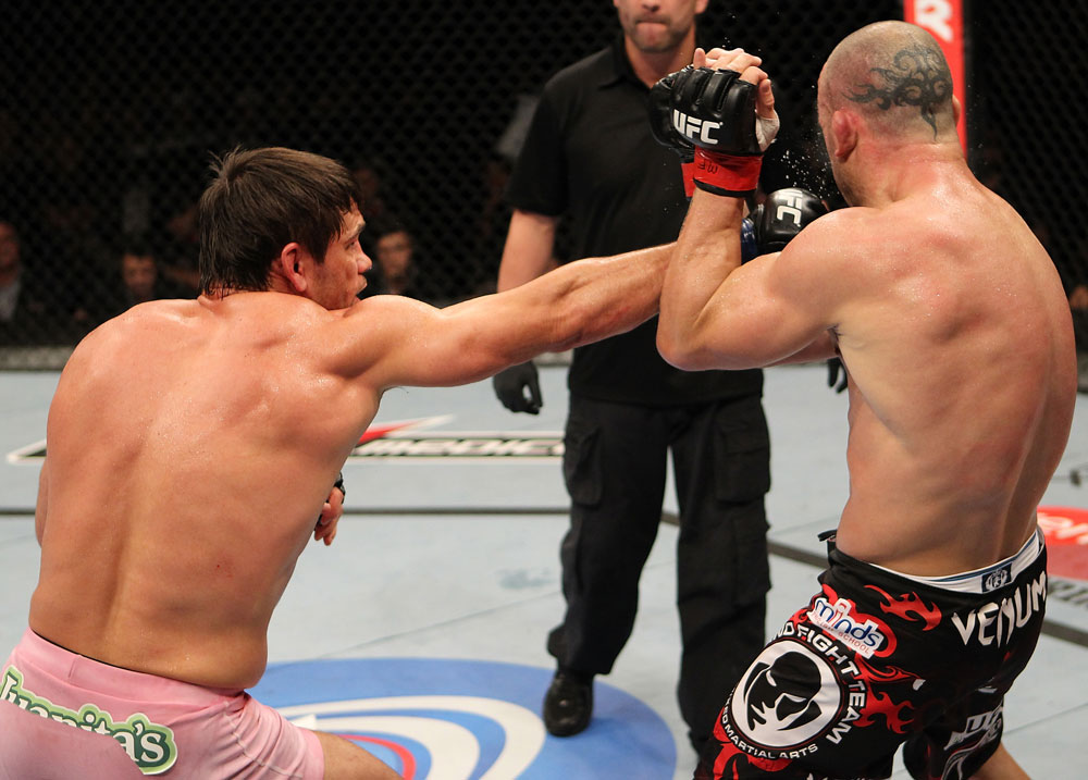 BELO HORIZONTE, BRAZIL - JUNE 23: (L-R) Rich Franklin punches Wanderlei Silva during their UFC 147 catchweight bout at Estadio Jornalista Felipe Drummond on June 23, 2012 in Belo Horizonte, Brazil. (Photo by Josh Hedges/Zuffa LLC/Zuffa LLC via Getty Images)
