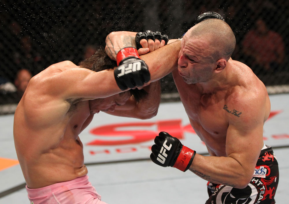 BELO HORIZONTE, BRAZIL - JUNE 23: (R-L) Wanderlei Silva punches Rich Franklin during their UFC 147 catchweight bout at Estadio Jornalista Felipe Drummond on June 23, 2012 in Belo Horizonte, Brazil. (Photo by Josh Hedges/Zuffa LLC/Zuffa LLC via Getty Images)