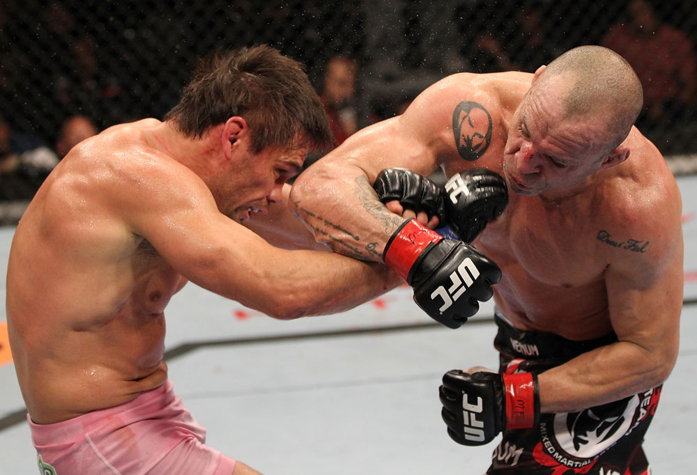 BELO HORIZONTE, BRAZIL - JUNE 23: (R-L) Wanderlei Silva punches Rich Franklin during their UFC 147 catchweight bout at Estadio Jornalista Felipe Drummond on June 23, 2012 in Belo Horizonte, Brazil. (Photo by Josh Hedges/Zuffa LLC/Zuffa LLC via Getty Images)