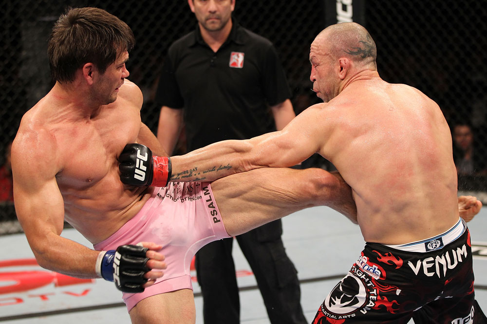 BELO HORIZONTE, BRAZIL - JUNE 23: (L-R) Rich Franklin kicks Wanderlei Silva during their UFC 147 catchweight bout at Estadio Jornalista Felipe Drummond on June 23, 2012 in Belo Horizonte, Brazil. (Photo by Josh Hedges/Zuffa LLC/Zuffa LLC via Getty Images)