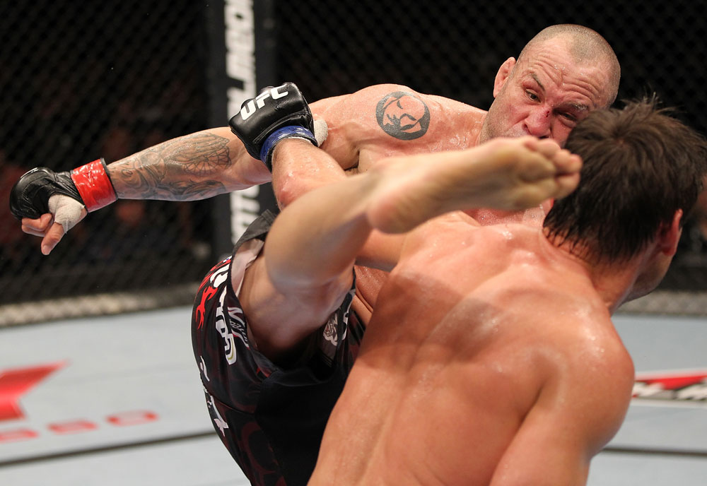 BELO HORIZONTE, BRAZIL - JUNE 23: (L-R) Wanderlei Silva kicks Rich Franklin during their UFC 147 catchweight bout at Estadio Jornalista Felipe Drummond on June 23, 2012 in Belo Horizonte, Brazil. (Photo by Josh Hedges/Zuffa LLC/Zuffa LLC via Getty Images)