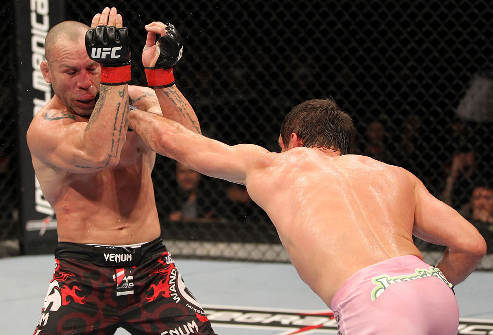 BELO HORIZONTE, BRAZIL - JUNE 23: (R-L) Rich Franklin punches Wanderlei Silva during their UFC 147 catchweight bout at Estadio Jornalista Felipe Drummond on June 23, 2012 in Belo Horizonte, Brazil. (Photo by Josh Hedges/Zuffa LLC/Zuffa LLC via Getty Images)