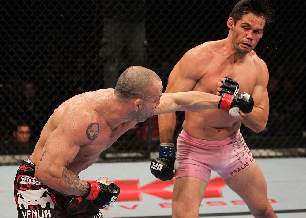 BELO HORIZONTE, BRAZIL - JUNE 23: (L-R) Wanderlei Silva punches Rich Franklin during their UFC 147 catchweight bout at Estadio Jornalista Felipe Drummond on June 23, 2012 in Belo Horizonte, Brazil. (Photo by Josh Hedges/Zuffa LLC/Zuffa LLC via Getty Images)