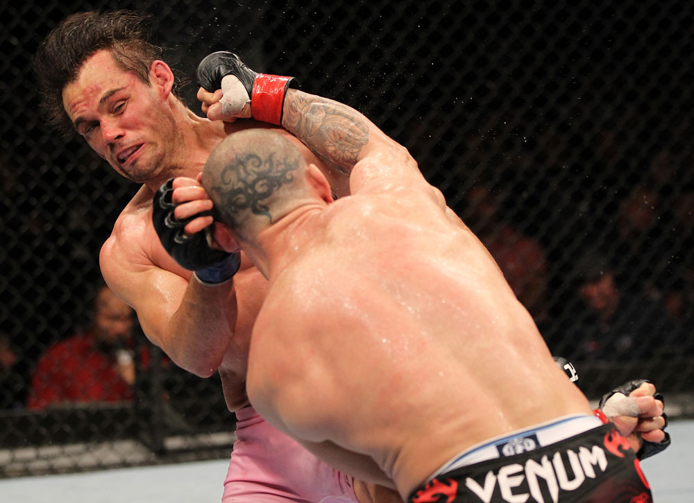 BELO HORIZONTE, BRAZIL - JUNE 23: (R-L) Wanderlei Silva punches Rich Franklin during their UFC 147 catchweight bout at Estadio Jornalista Felipe Drummond on June 23, 2012 in Belo Horizonte, Brazil. (Photo by Josh Hedges/Zuffa LLC/Zuffa LLC via Getty Images)