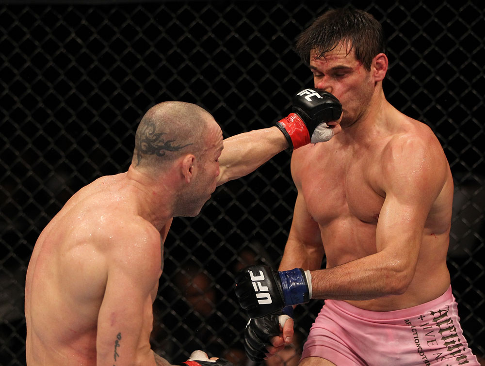BELO HORIZONTE, BRAZIL - JUNE 23: (L-R) Wanderlei Silva punches Rich Franklin during their UFC 147 catchweight bout at Estadio Jornalista Felipe Drummond on June 23, 2012 in Belo Horizonte, Brazil. (Photo by Josh Hedges/Zuffa LLC/Zuffa LLC via Getty Images)