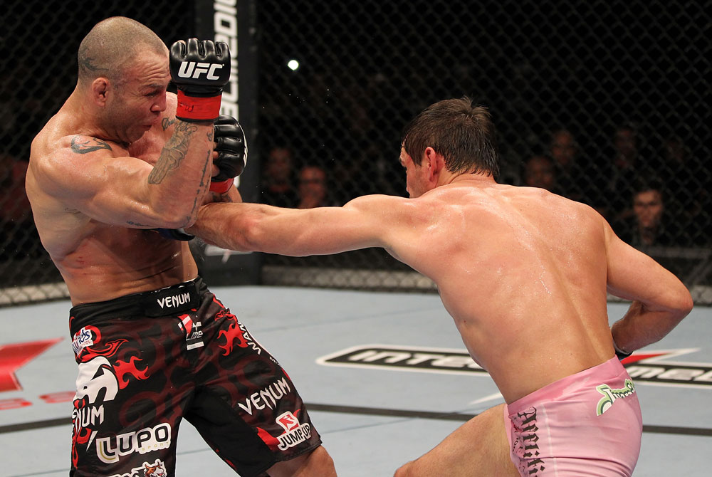 BELO HORIZONTE, BRAZIL - JUNE 23: (R-L) Rich Franklin punches Wanderlei Silva during their UFC 147 catchweight bout at Estadio Jornalista Felipe Drummond on June 23, 2012 in Belo Horizonte, Brazil. (Photo by Josh Hedges/Zuffa LLC/Zuffa LLC via Getty Images)