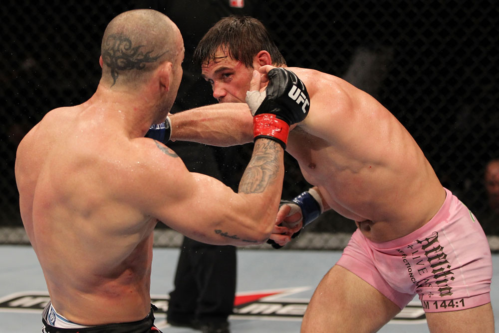 BELO HORIZONTE, BRAZIL - JUNE 23: (R-L) Rich Franklin punches Wanderlei Silva during their UFC 147 catchweight bout at Estadio Jornalista Felipe Drummond on June 23, 2012 in Belo Horizonte, Brazil. (Photo by Josh Hedges/Zuffa LLC/Zuffa LLC via Getty Images)