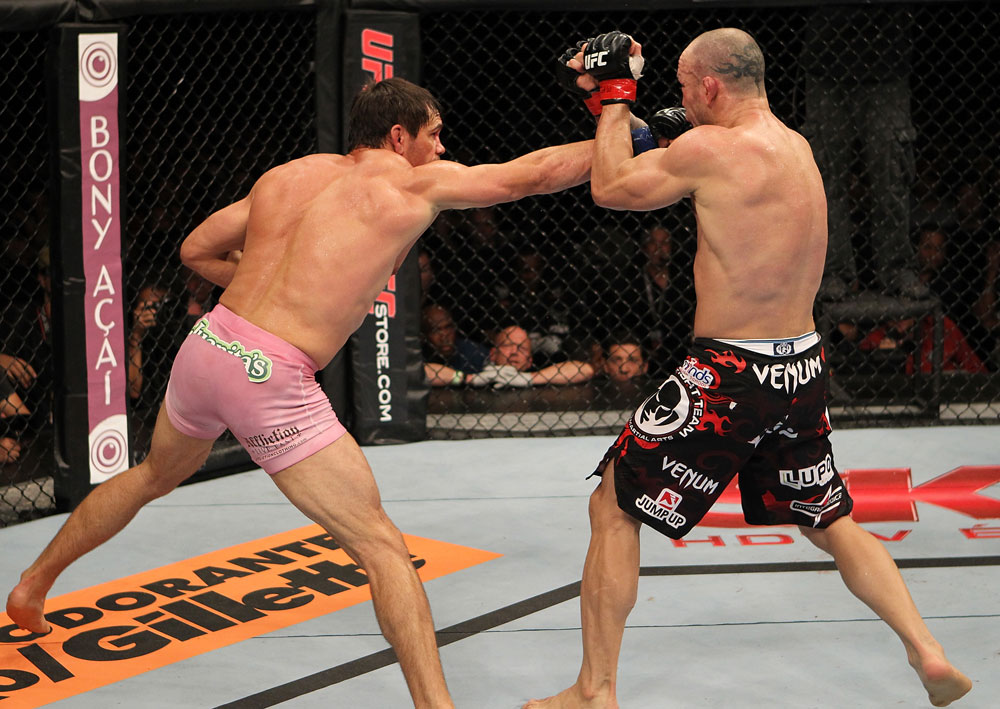 BELO HORIZONTE, BRAZIL - JUNE 23: (L-R) Rich Franklin punches Wanderlei Silva during their UFC 147 catchweight bout at Estadio Jornalista Felipe Drummond on June 23, 2012 in Belo Horizonte, Brazil. (Photo by Josh Hedges/Zuffa LLC/Zuffa LLC via Getty Images)