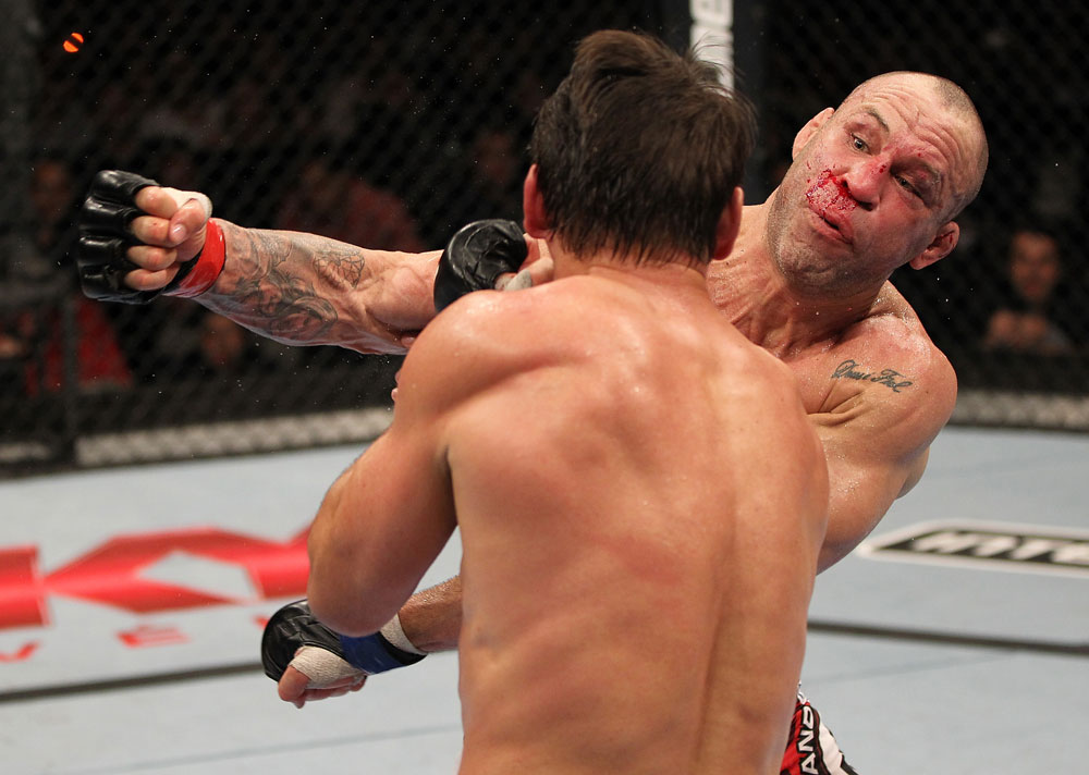 BELO HORIZONTE, BRAZIL - JUNE 23: (R-L) Wanderlei Silva punches Rich Franklin during their UFC 147 catchweight bout at Estadio Jornalista Felipe Drummond on June 23, 2012 in Belo Horizonte, Brazil. (Photo by Josh Hedges/Zuffa LLC/Zuffa LLC via Getty Images)
