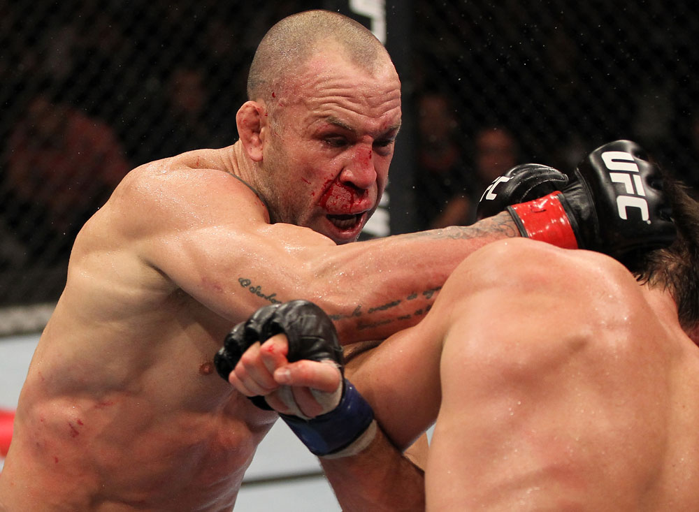 BELO HORIZONTE, BRAZIL - JUNE 23: (L-R) Wanderlei Silva punches Rich Franklin during their UFC 147 catchweight bout at Estadio Jornalista Felipe Drummond on June 23, 2012 in Belo Horizonte, Brazil. (Photo by Josh Hedges/Zuffa LLC/Zuffa LLC via Getty Images)
