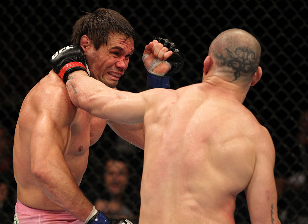 BELO HORIZONTE, BRAZIL - JUNE 23: (R-L) Wanderlei Silva punches Rich Franklin during their UFC 147 catchweight bout at Estadio Jornalista Felipe Drummond on June 23, 2012 in Belo Horizonte, Brazil. (Photo by Josh Hedges/Zuffa LLC/Zuffa LLC via Getty Images)
