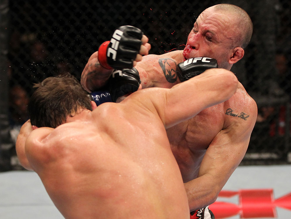 BELO HORIZONTE, BRAZIL - JUNE 23: (R-L) Wanderlei Silva and Rich Franklin trade punches during their UFC 147 catchweight bout at Estadio Jornalista Felipe Drummond on June 23, 2012 in Belo Horizonte, Brazil. (Photo by Josh Hedges/Zuffa LLC/Zuffa LLC via Getty Images)