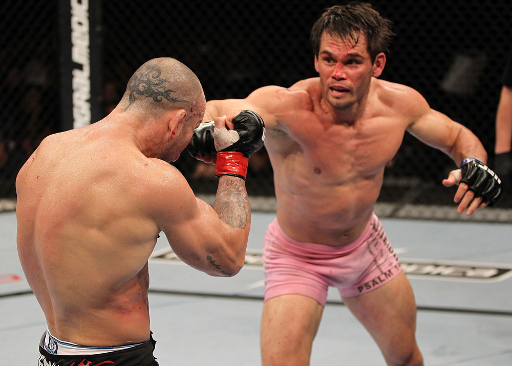 BELO HORIZONTE, BRAZIL - JUNE 23: (R-L) Rich Franklin punches Wanderlei Silva during their UFC 147 catchweight bout at Estadio Jornalista Felipe Drummond on June 23, 2012 in Belo Horizonte, Brazil. (Photo by Josh Hedges/Zuffa LLC/Zuffa LLC via Getty Images)