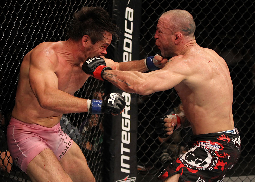 BELO HORIZONTE, BRAZIL - JUNE 23: (R-L) Wanderlei Silva and Rich Franklin trade punches during their UFC 147 catchweight bout at Estadio Jornalista Felipe Drummond on June 23, 2012 in Belo Horizonte, Brazil. (Photo by Josh Hedges/Zuffa LLC/Zuffa LLC via Getty Images)