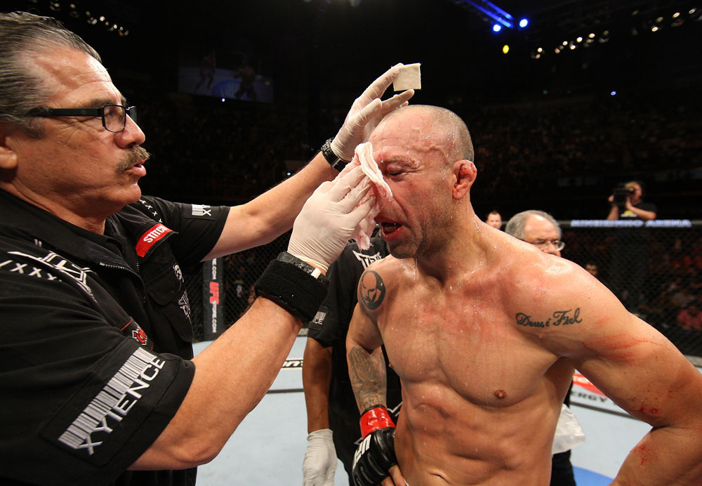 BELO HORIZONTE, BRAZIL - JUNE 23:   Wanderlei Silva receives treatment from cutman Jacob "Stitch" Duran after his five-round battle against Rich Franklin during UFC 147 at Estadio Jornalista Felipe Drummond on June 23, 2012 in Belo Horizonte, Brazil.  (Photo by Josh Hedges/Zuffa LLC/Zuffa LLC via Getty Images)
