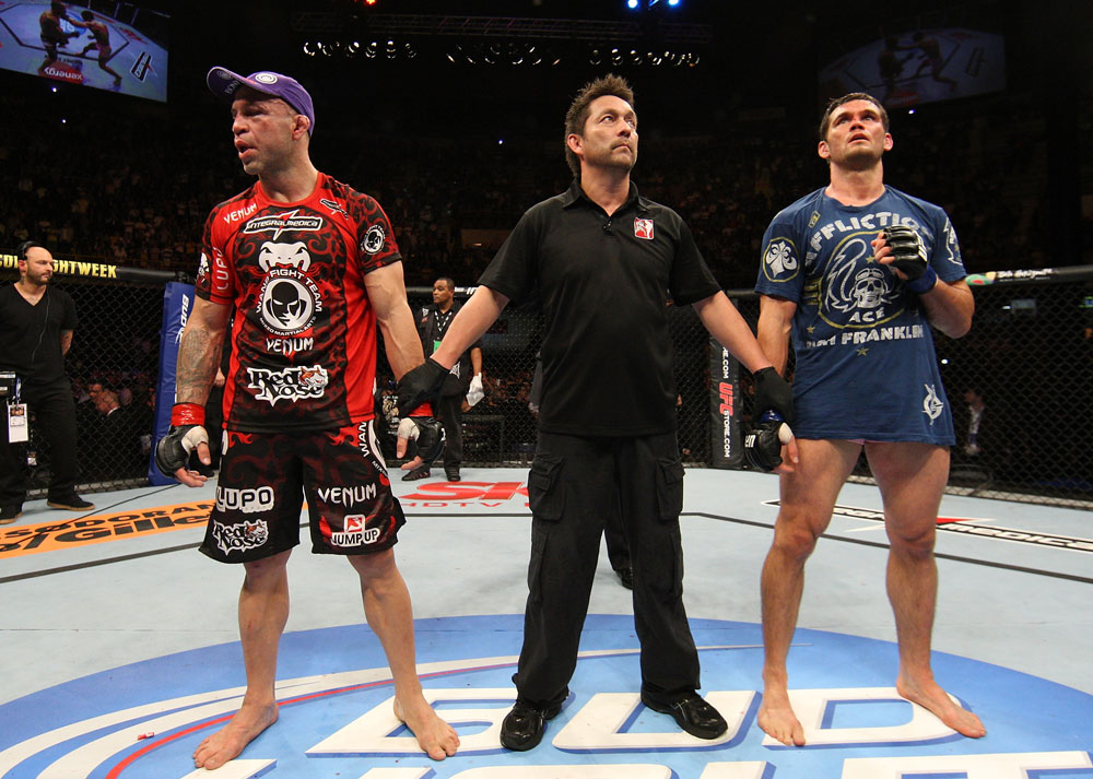 BELO HORIZONTE, BRAZIL - JUNE 23: Wanderlei Silva (L) and Rich Franklin (R) await the decision after their five-round battle during UFC 147 at Estadio Jornalista Felipe Drummond on June 23, 2012 in Belo Horizonte, Brazil. (Photo by Josh Hedges/Zuffa LLC/Zuffa LLC via Getty Images)
