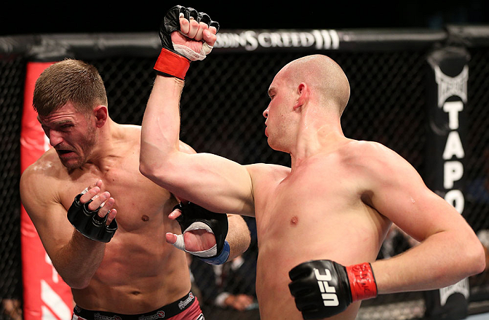 NOTTINGHAM, ENGLAND - SEPTEMBER 29: (R-L) Strefan Struve punches Stipe Miocic during their heavyweight fight at the UFC on Fuel TV event at Capital FM Arena on September 29, 2012 in Nottingham, England. (Photo by Josh Hedges/Zuffa LLC/Zuffa LLC via Getty Images)